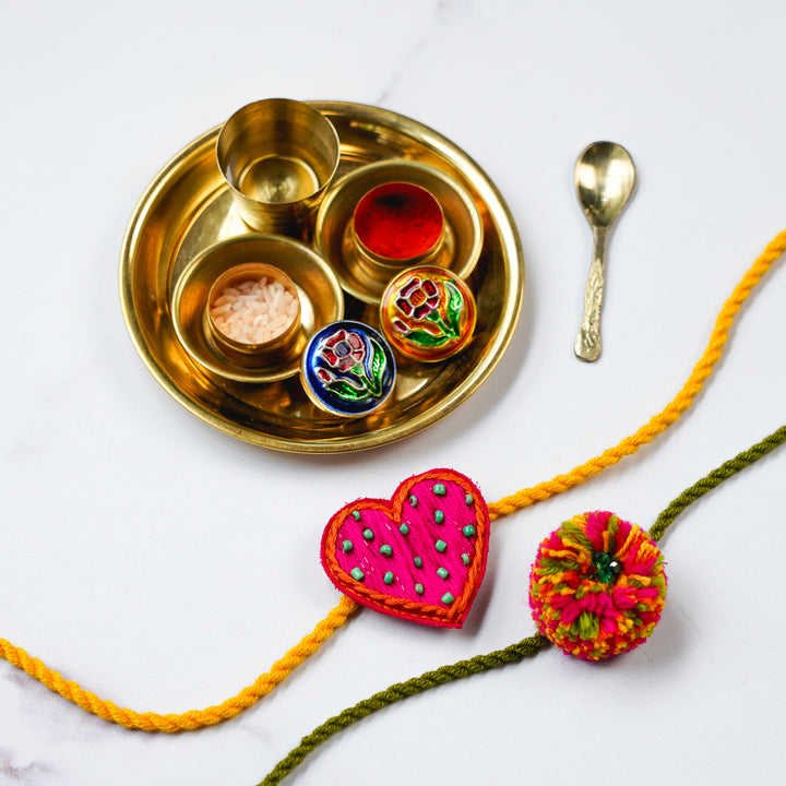2 pc Rakhi + Brass Thali Set | Premium Dil Vali Beads & Pom Pom Rakhi Set with Roli Chawal