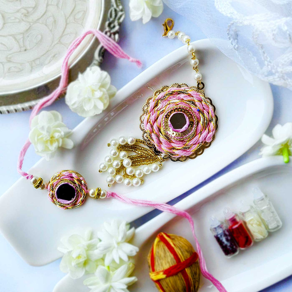 Handmade Mirror Work Braided Rakhi Hamper With Roli Chawal For Bhaiya And Bhabhi - Pair Set Front View Pink Variant