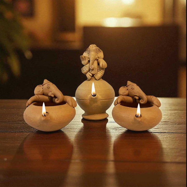 Handmade Ganesh Design Terracotta Oil Lamp / Diya | Includes 1 Magic Diya And 2 Diyas