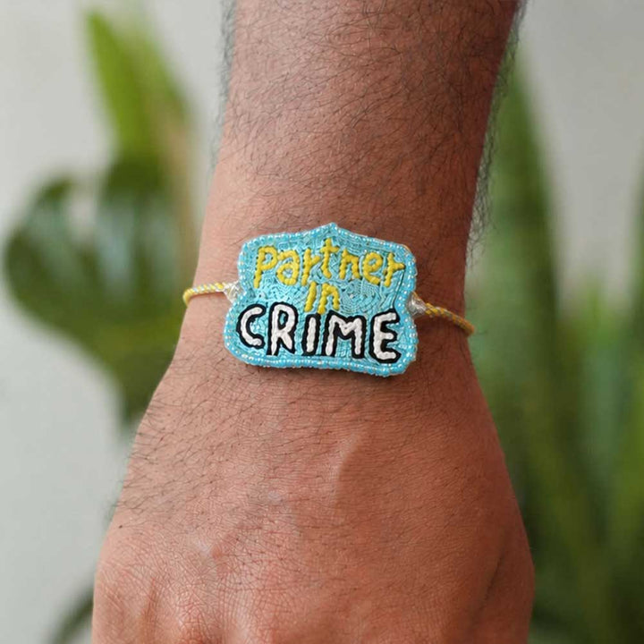 Handmade Beaded Partner In Crime Theme Rakhi With Roli Chawal For Brother