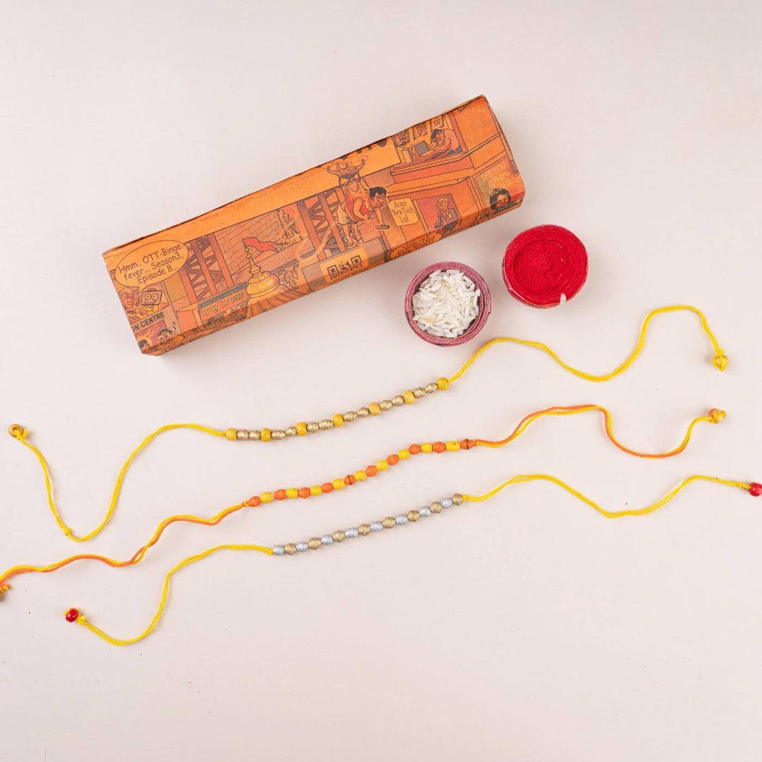 Handcrafted Paper Beads Rakhi Hamper With Rice Roli 1 - Two Rakhis with Box and Powder
