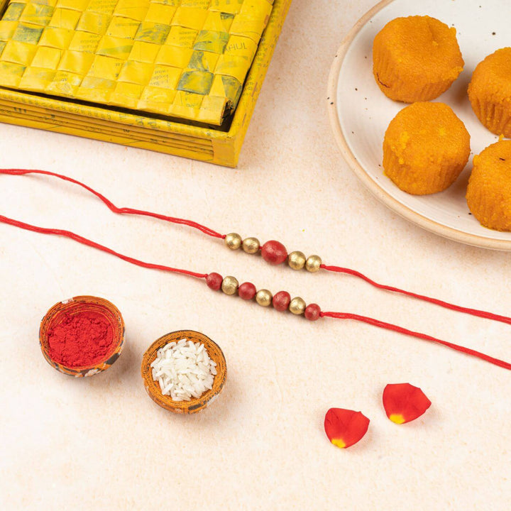 Handcrafted Terracotta Rakhi Hamper With Rice Roli - Decorative Rakhi with Thali Items