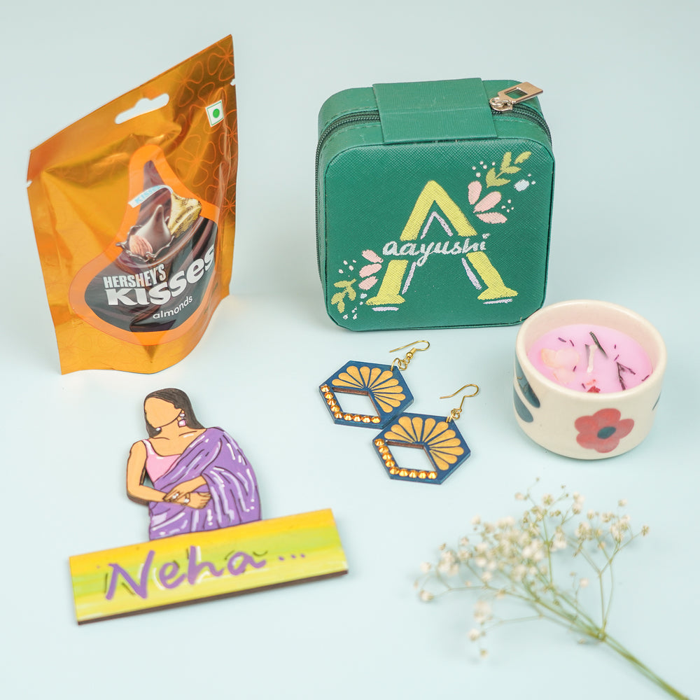 Personalized Handmade Gift Hamper For Sisters Includes 1 Jewellery Box 1 Set Earring 1 Candle 1 Chocolate And 1 Fridge Magnet - Top View of Gift Items