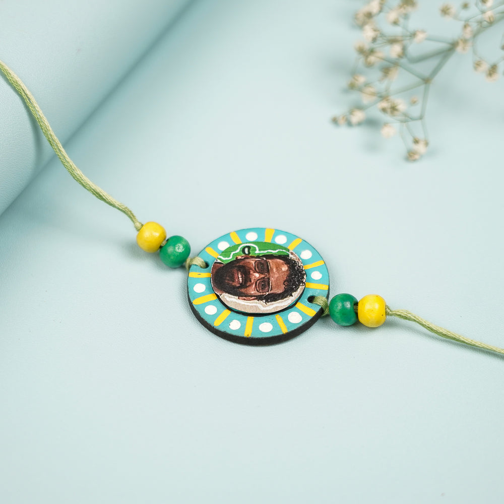 Photo Personalized Hand Painted Round Shape Mdf Wood Rakhi - Full Product with Background Elements