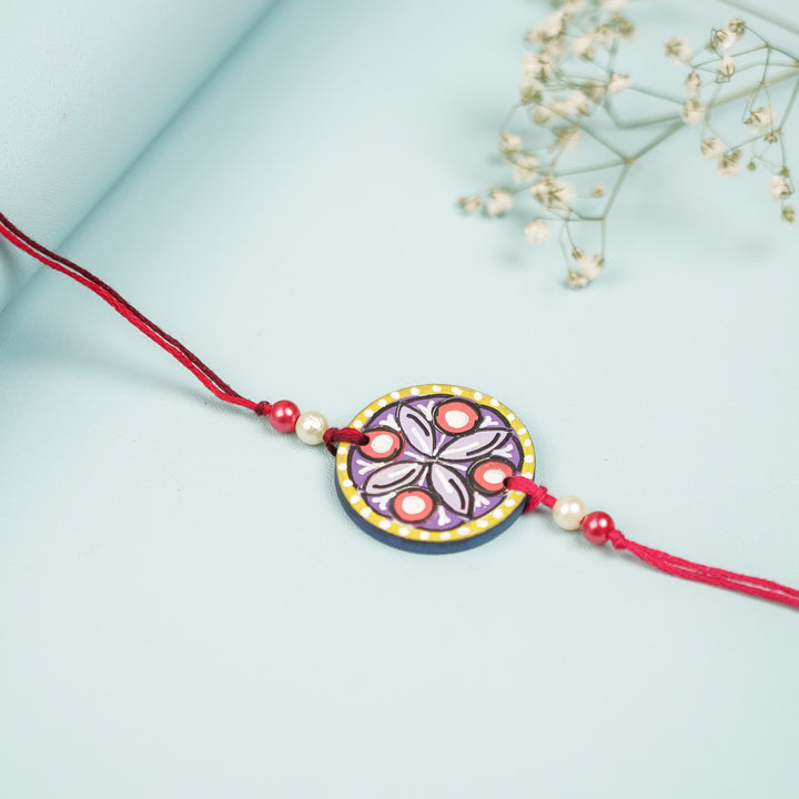 Customized Hand Painted Mandala Design Mdf Wood Rakhi - Close-up on Flat Surface (4)
