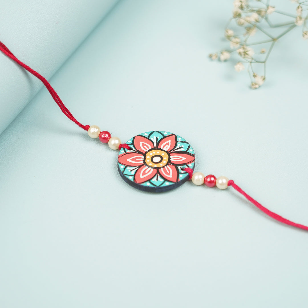 Customized Hand Painted Mandala Design Mdf Wood Rakhi - Close-up on Flat Surface
