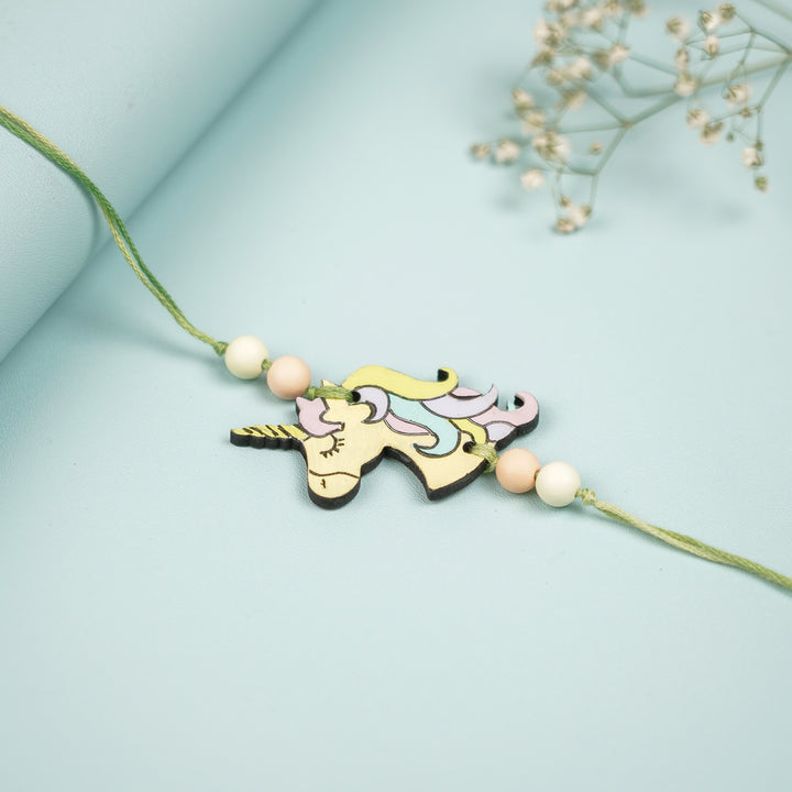 Hand Painted Unicorn Design Mdf Wood Kids Rakhi - Close-up of Unicorn Pendant