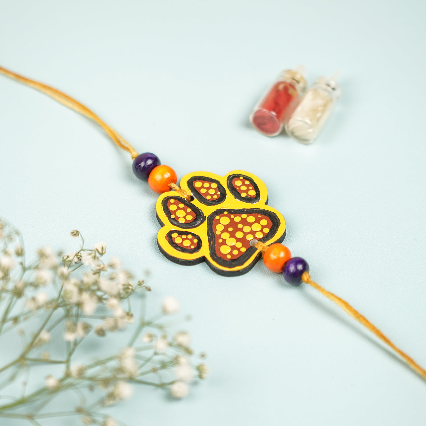 Buy Hand-Painted Paw Design MDF Wood Kids Rakhi Online On Zwende