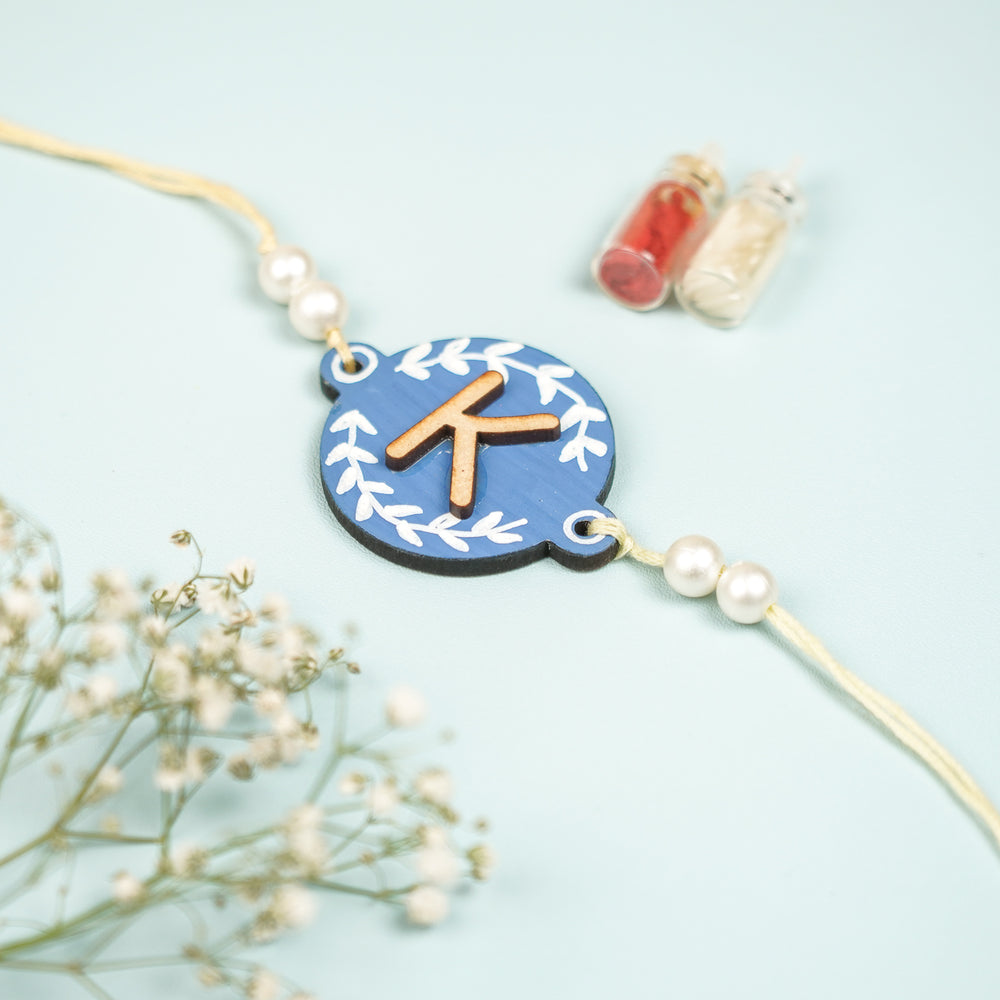 Personalized Hand Painted Layered Monogram Design Mdf Wood Rakhi - Front View (2)