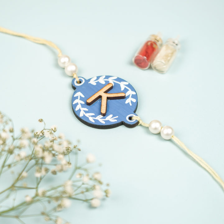 Personalized Hand Painted Layered Monogram Design Mdf Wood Rakhi - Front View (2)