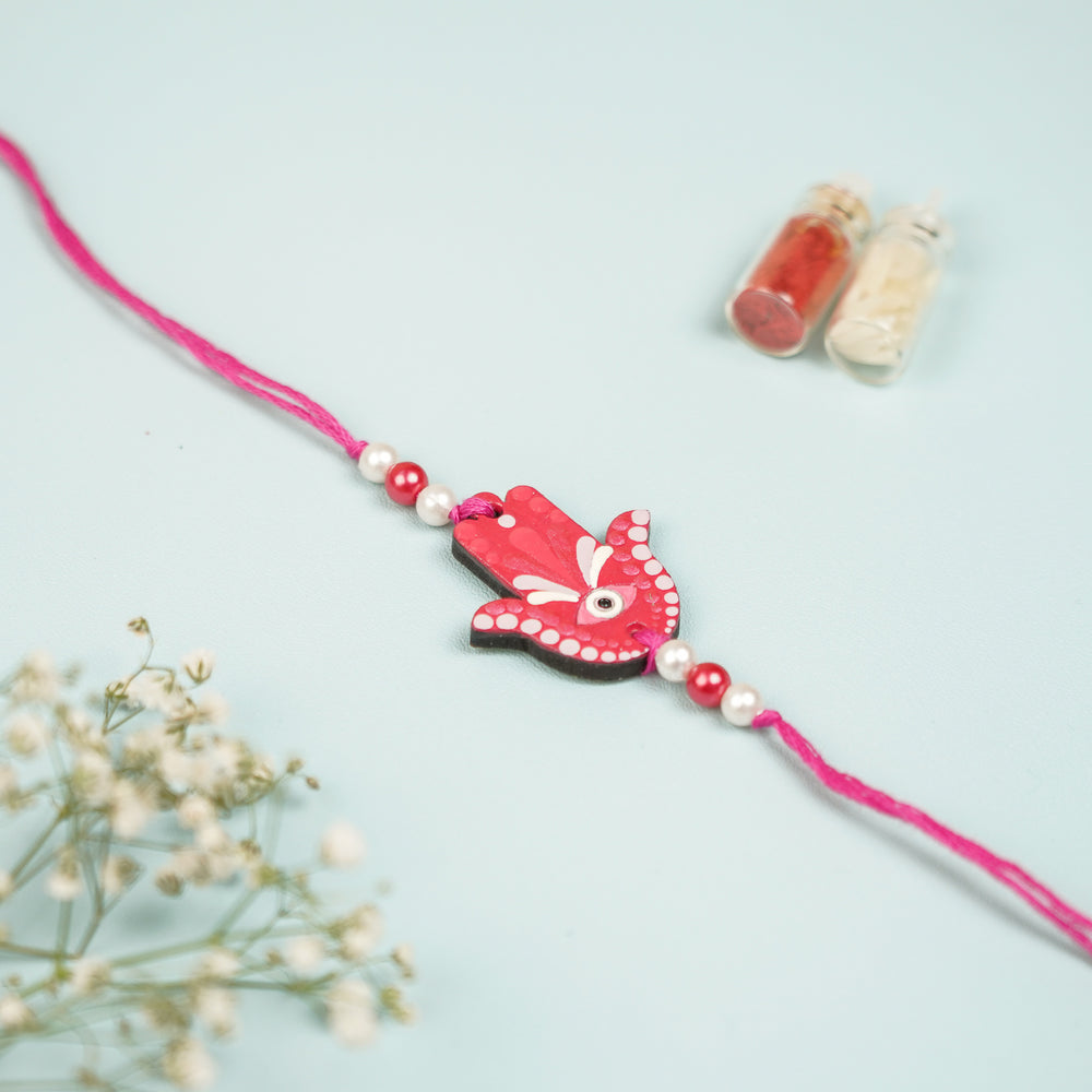 Customized Hand Painted Hamsa Hand Design Mdf Wood Rakhi - Front View with Decorative Bottles (2)
