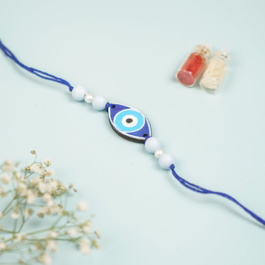 Customized Hand Painted Evil Eye Design Mdf Wood Rakhi - Front View Showing Product Length