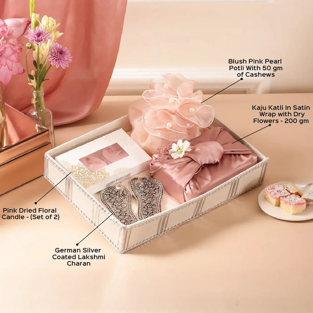 Blissful Blessings of Diwali Gift Hamper | Includes 1 Lakshmi Charan, 1 Cashew Potli, 2 Floral Candles, 1 Kaju Katli, 1 Greeting Card, 1 Gift Box