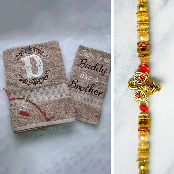 Personalized Embroidered Beige Cotton Towel Rakhi Hamper With Roli Chawal For Brother | Includes 1 Hand Towel, 1 Bath Towel & 1 Rakhi
