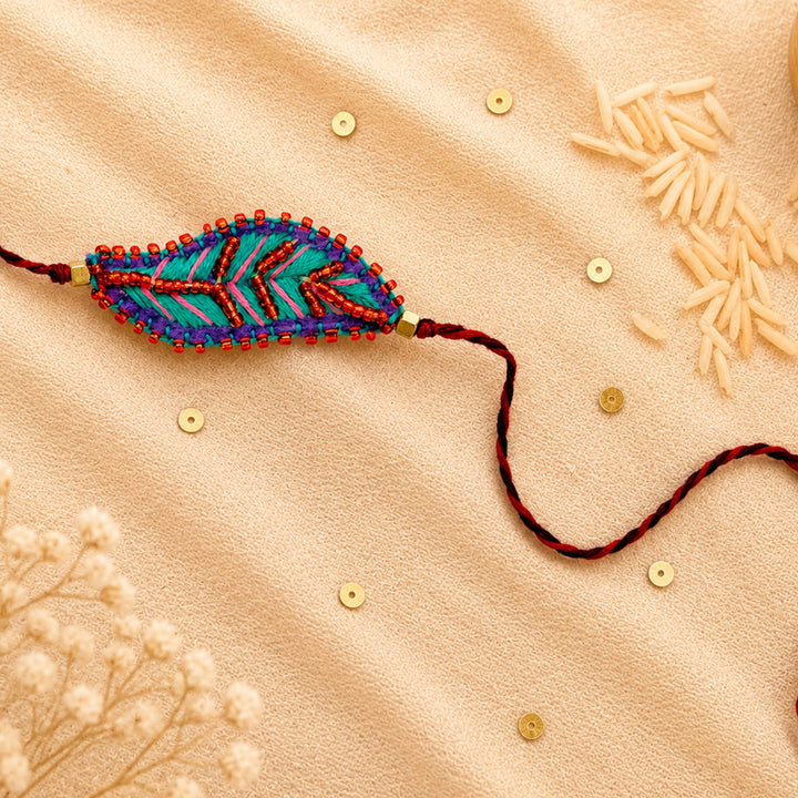 Hand Embroidered Leaf Ornamental Rakhi For Brother