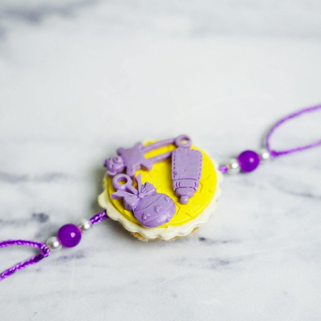 Handmade Porcelain Clay Themed Rakhi 5 - Close-up Angled View