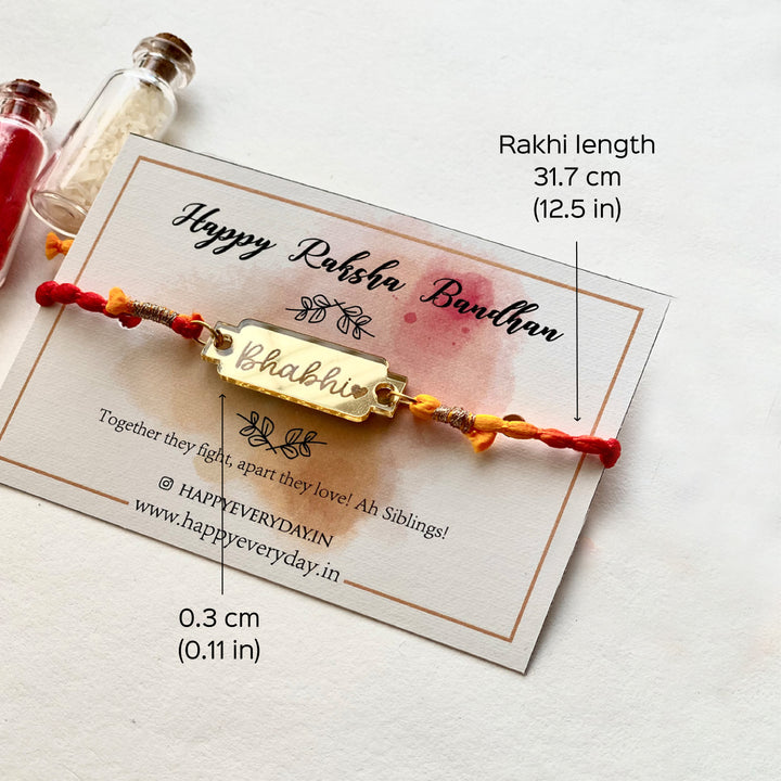 Handcrafted Golden Acrylic Rakhi With Roli Chawal