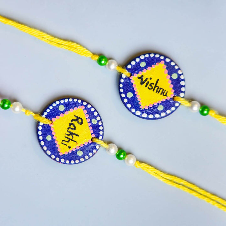 Persoanlized Terracotta Hobby Theme Rakhi Hamper for Bhaiya & Bhabhi