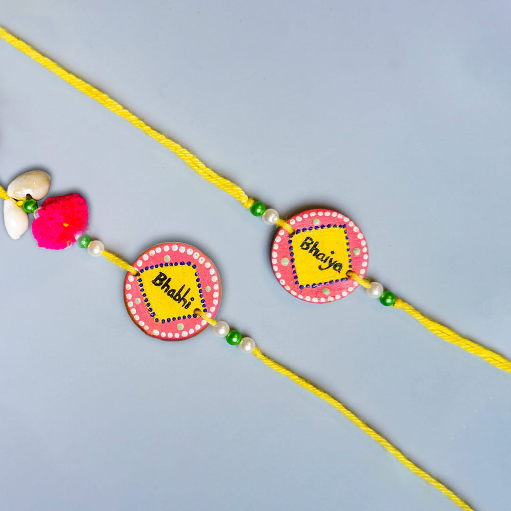 Handcrafted Bhaiya Bhabhi Terracotta Rakhi With Roli Chawal 1 - Close-up on Rakhi pairs