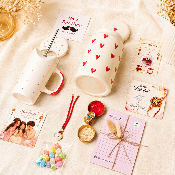 "Heartfelt Sibling Love" Jar Ceramic Rakhi Hamper With Red Sipper & Evil Eye Rakhi For Brother