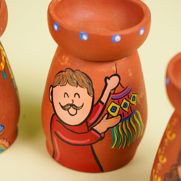 Hand-Painted Diwali Scene Theme Terracotta Tealight Holder | Set Of 4