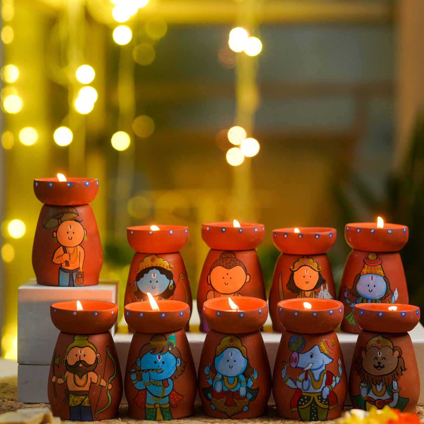 ヒトガタ No.2 オブジェ Buy Dashavatar Hand-Painted Terracotta Tealight Holder | Set Of 10