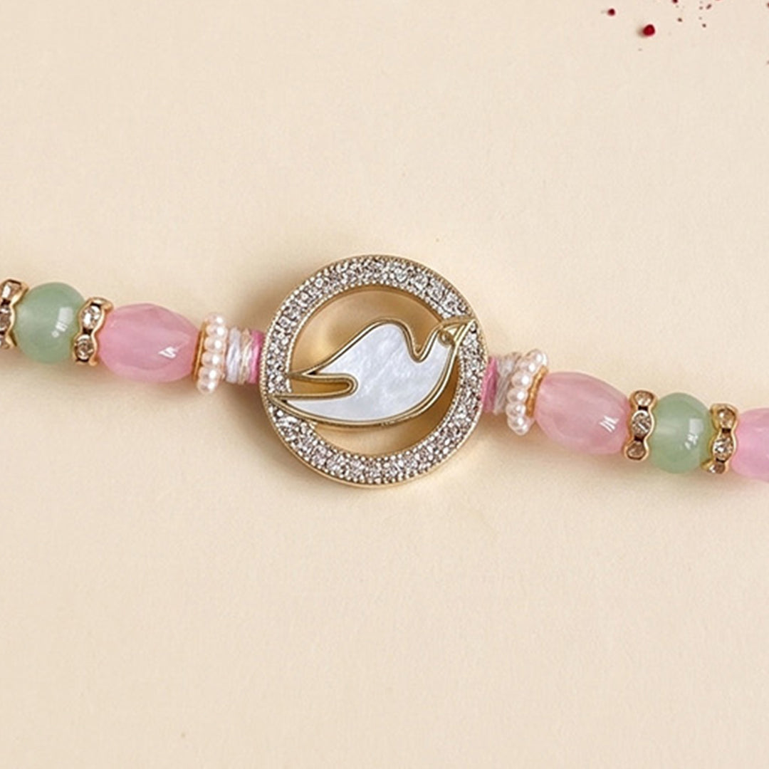 Swan Mother of Pearl Rakhi For Brother With Roli Chawal