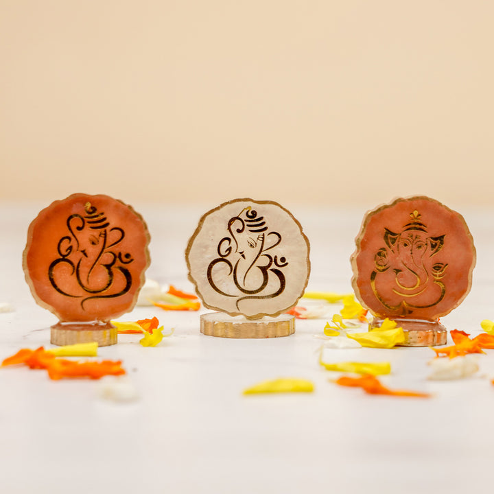 Set of 3 | Handmade Irregular Round Ganesha Resin Art Idol Showpieces With Stand For Festive Gifting