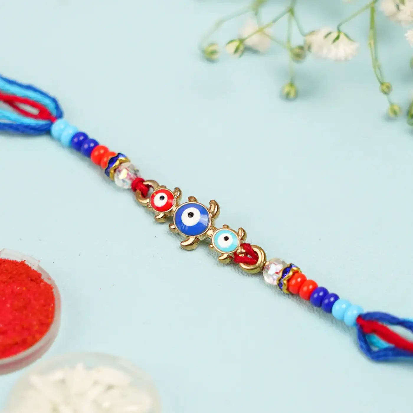 Buy Handmade Beaded Turtle Evil Eye Rakhi With Roli Chawal Online On Zwende