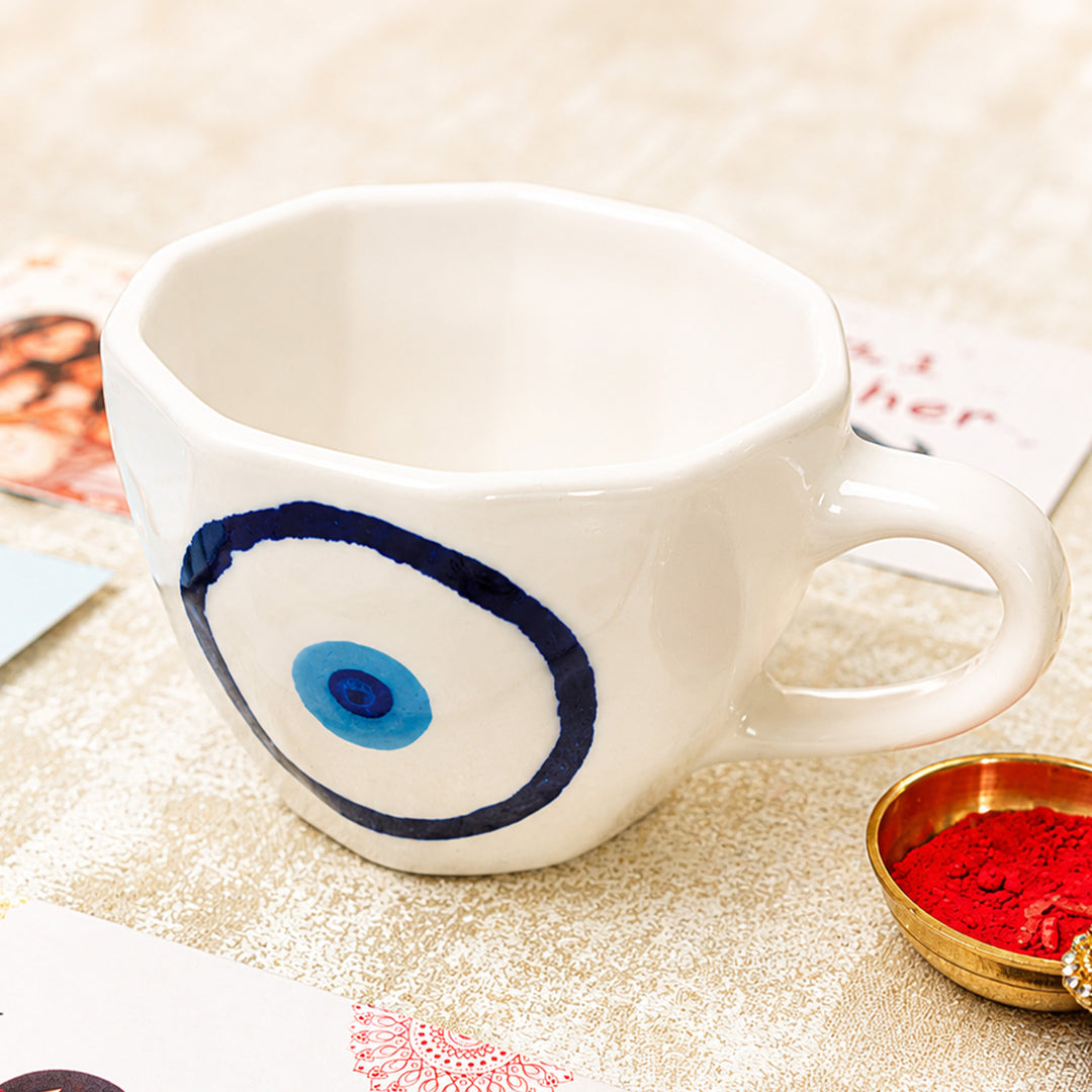 "Evil Eye Blessings" Ceramic Mug Rakhi Hamper With Rakhi Set & Roli Chawal For Bhaiya Bhabhi