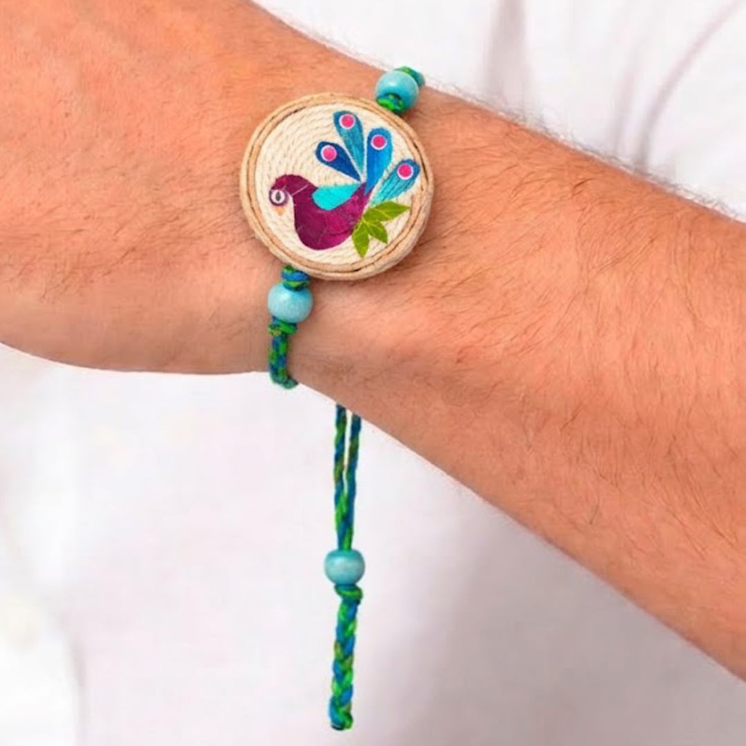 Handmade Pressed Flower Art Peacock Jute Rakhi With Roli Chawal