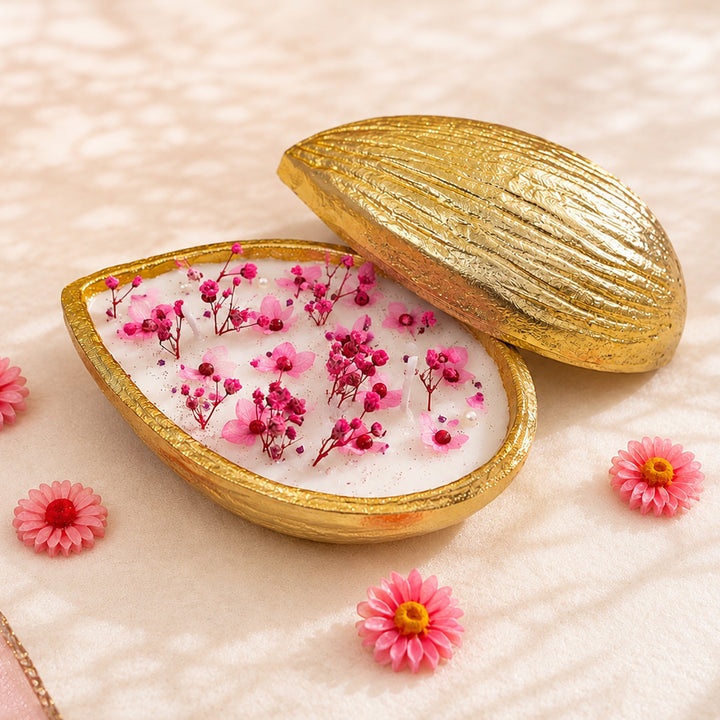 Handcrafted Golden Blossom Almond Shaped Brass Urli Amber Scented Soy Wax Candle With Dried Flowers