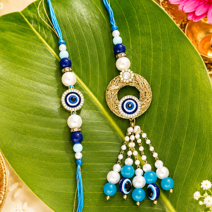 Handmade Beaded Evil Eye Rakhi & Golden Lumba Gift Set For Bhaiya Bhabhi | Set of 2