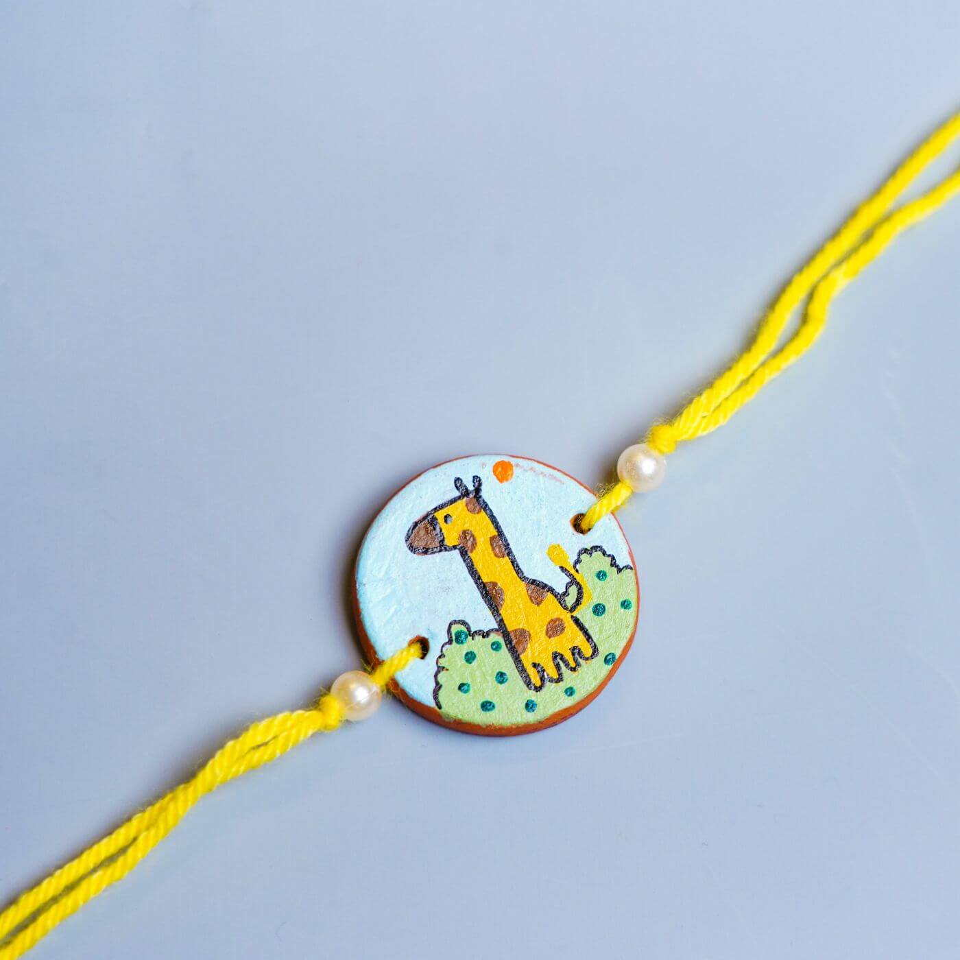 Buy Personalized Animal Theme Terracotta Rakhi With Roli Chawal for ...