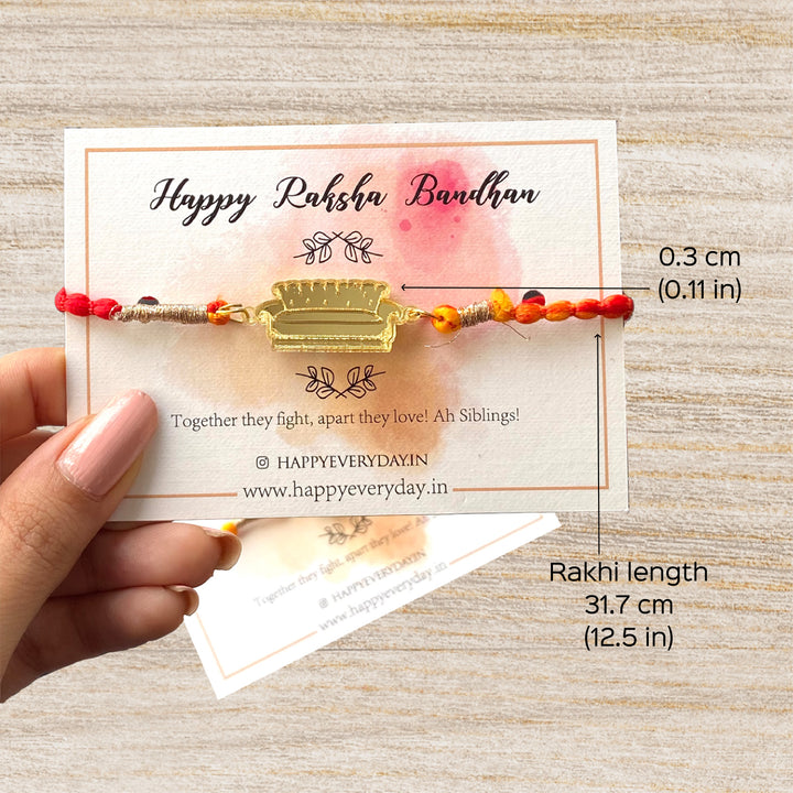 Handcrafted Golden Acrylic Rakhi With Roli Chawal