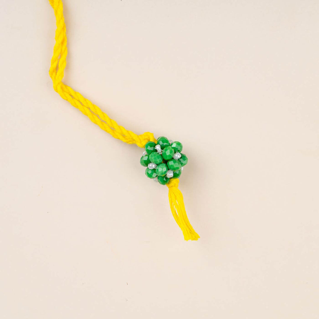 Handcrafted Glass Beads Lumba Rakhi 1 - Green Beaded Close-up
