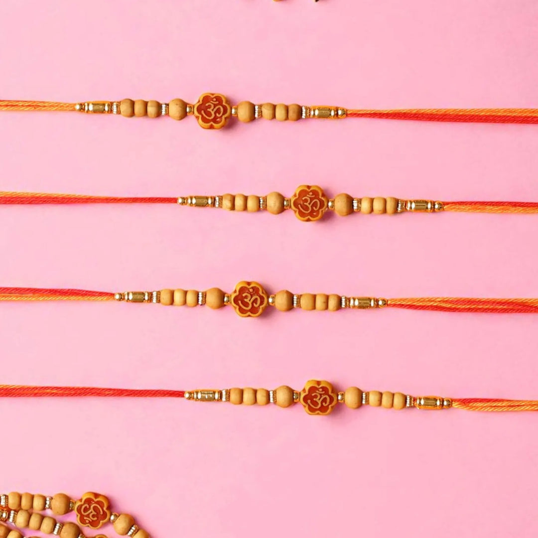 Handmade Om Dori Rakhi With Roli Chawal | Set Of 12