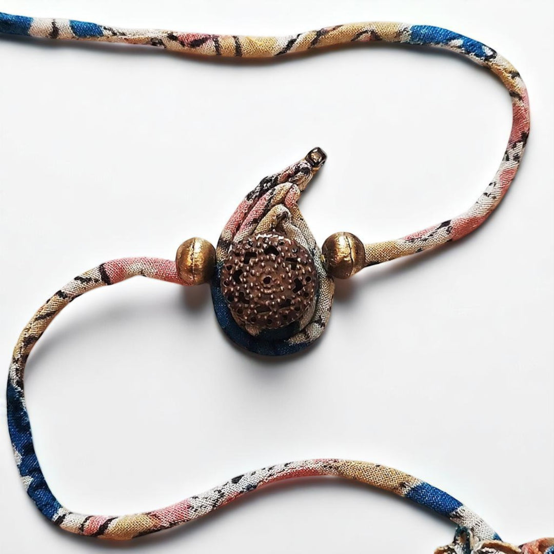 Handmade Dori Work Ambi Kalamkari Rakhi With Roli Chawal - Front View
