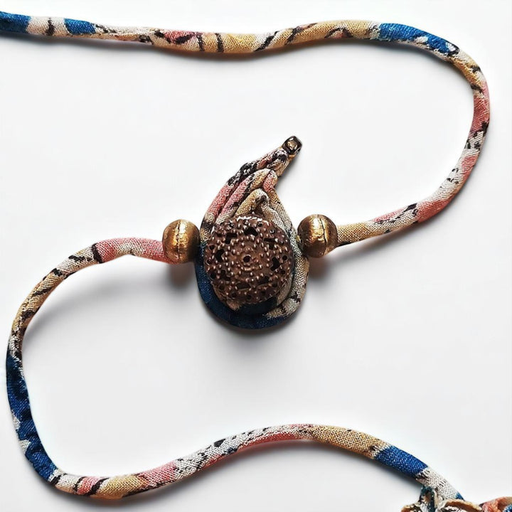 Handmade Dori Work Ambi Kalamkari Rakhi With Roli Chawal - Front View