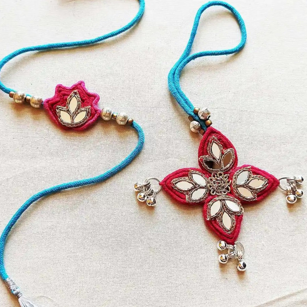 Handmade Mirror Work Lotus Bhaiya Bhabhi Rakhi With Roli Chawal Set Of 2 - Close-up Showing Details