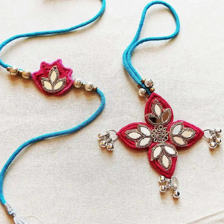 Handmade Mirror Work Lotus Bhaiya Bhabhi Rakhi With Roli Chawal Set Of 2 - Close-up Showing Details
