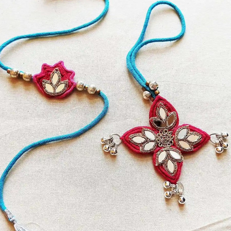 Handmade Mirror Work Lotus Bhaiya Bhabhi Rakhi With Roli Chawal Set Of 2 - Close-up Showing Details