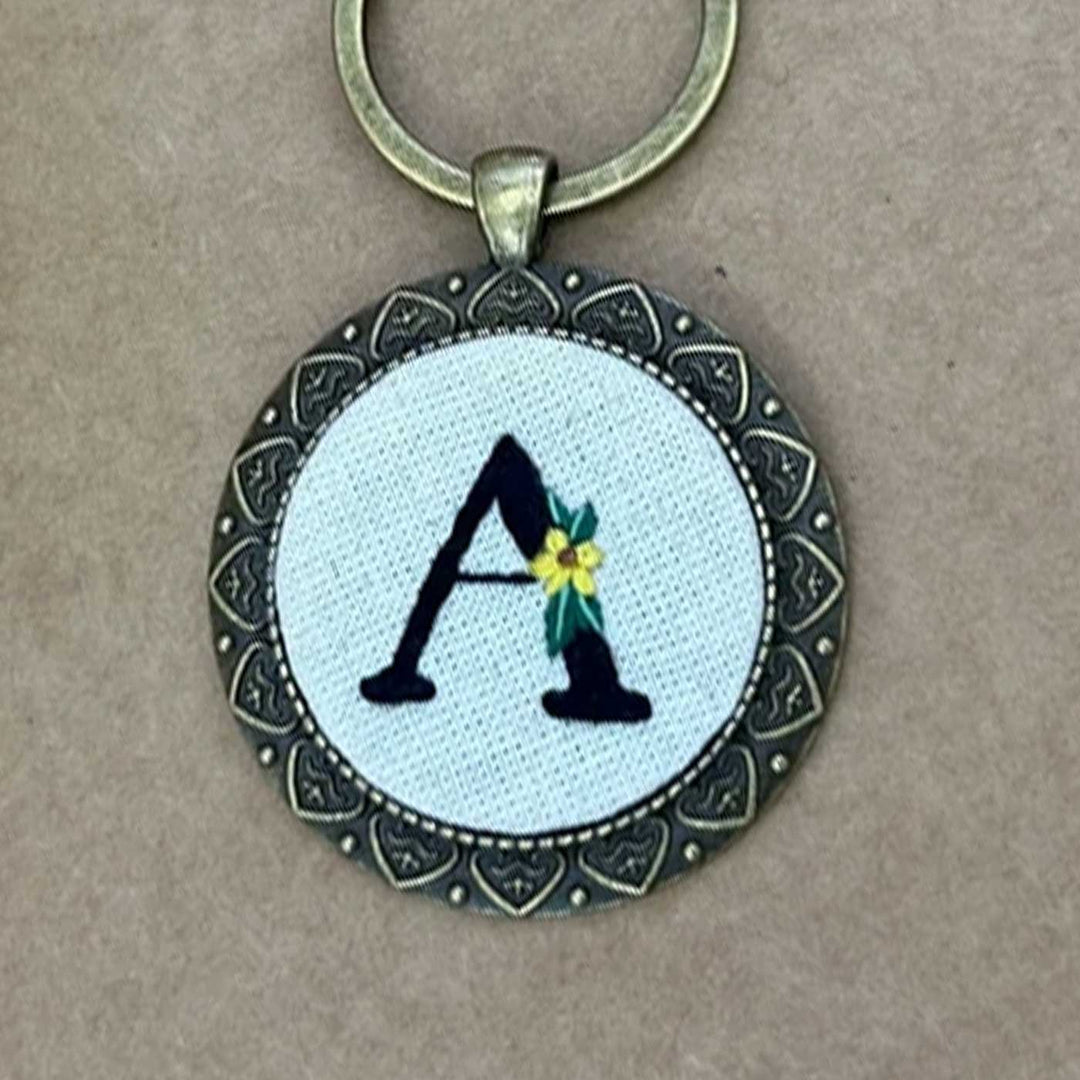 Personalized Handmade Embroidered Monogram And Flowers Metal Keychain