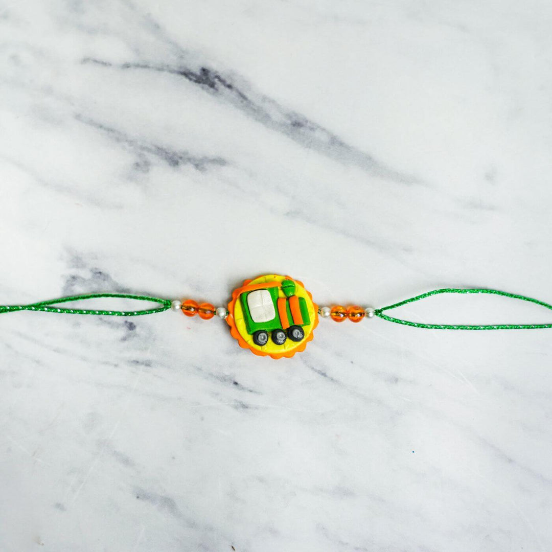 Handmade Porcelain Clay Themed Rakhi 5 - Flat Lay Front View