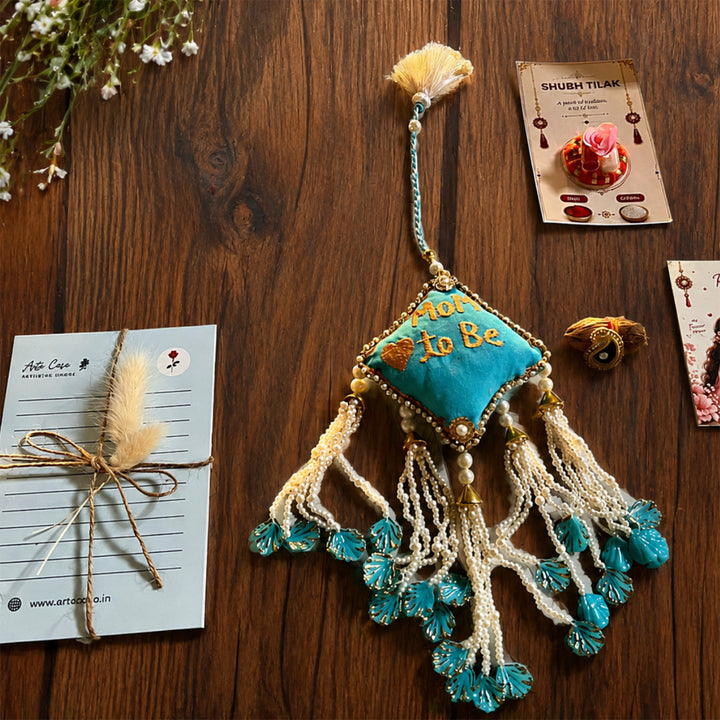 Mom-to-Be Ceramic Rakhi Hamper With Rakhi & Festive Cards For Sister