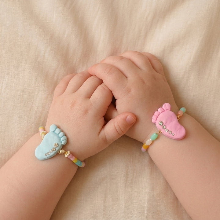 Handmade Blue & Pink Baby Feet Clay Rakhi With Roli Chawal For Twins | Set Of 2