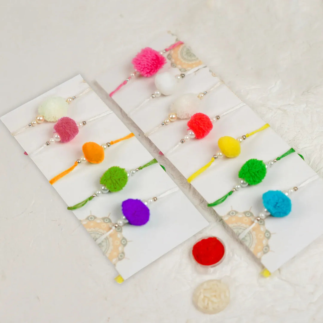 Handmade Assorted Pom Pom Rakhi With Roli Chawal | Set Of 12