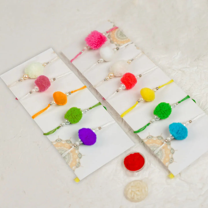 Handmade Assorted Pom Pom Rakhi With Roli Chawal | Set Of 12