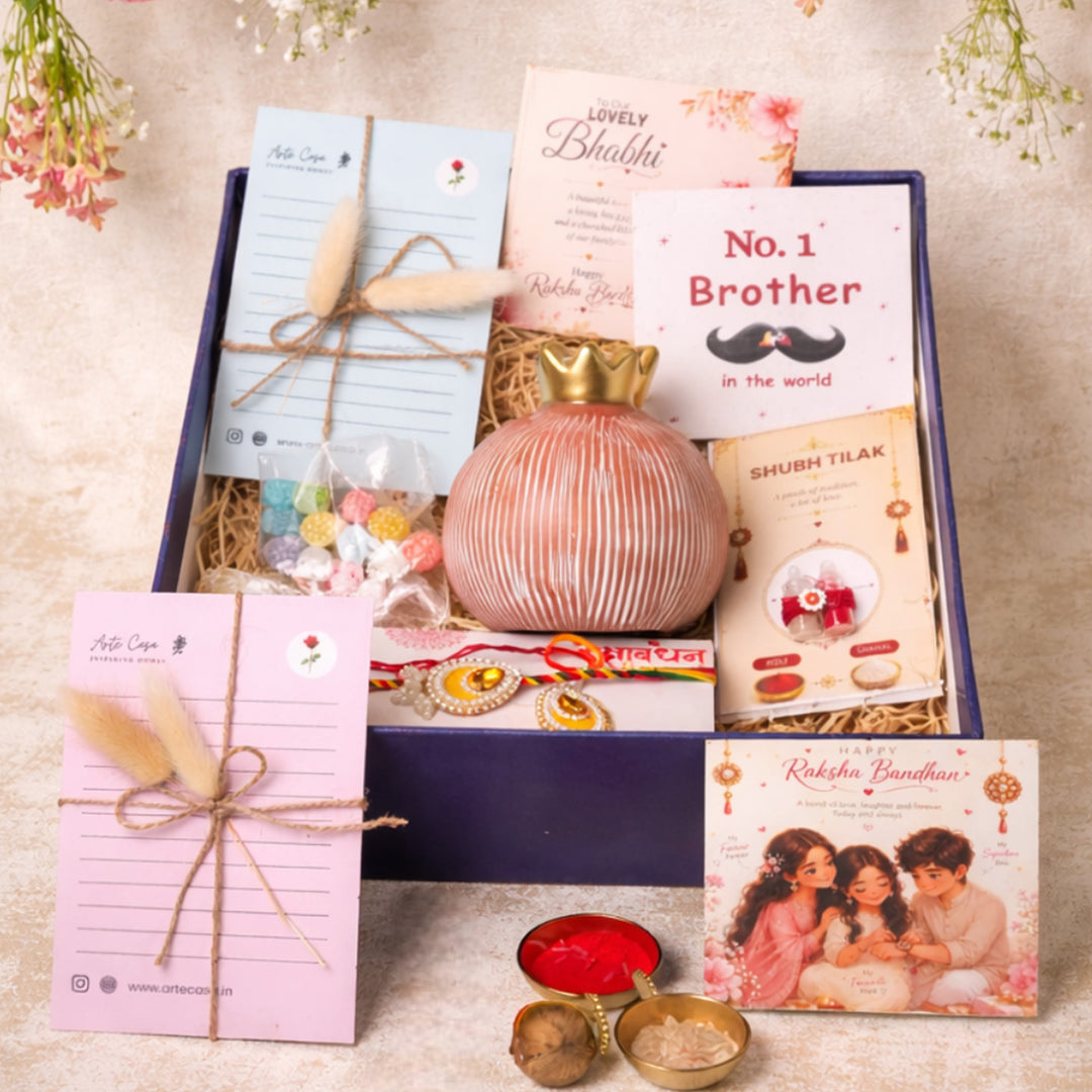 Pink Pomegranate Porcelain Vase Rakhi Hamper With Rakhi Set For Bhaiya Bhabhi