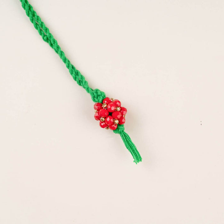 Handcrafted Glass Beads Lumba Rakhi 1 - Red Beaded Close-up